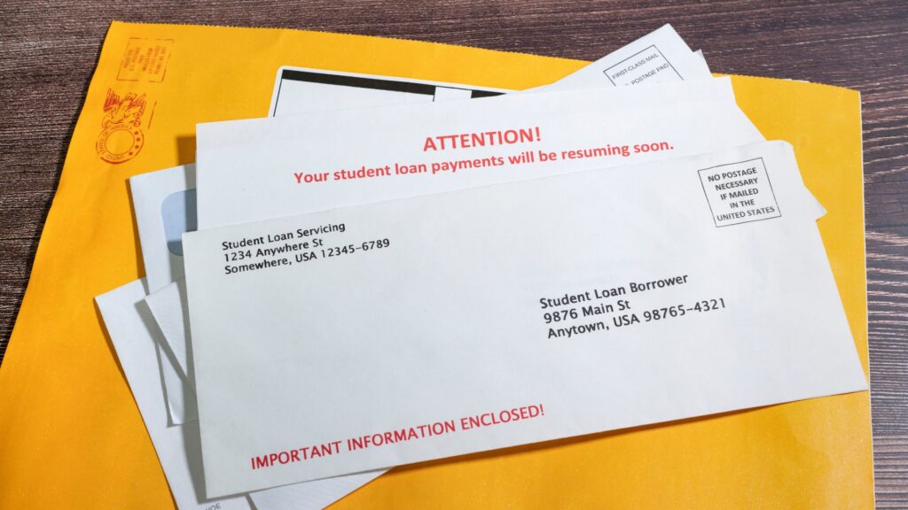 Envelope with student loan payment resuming notice.