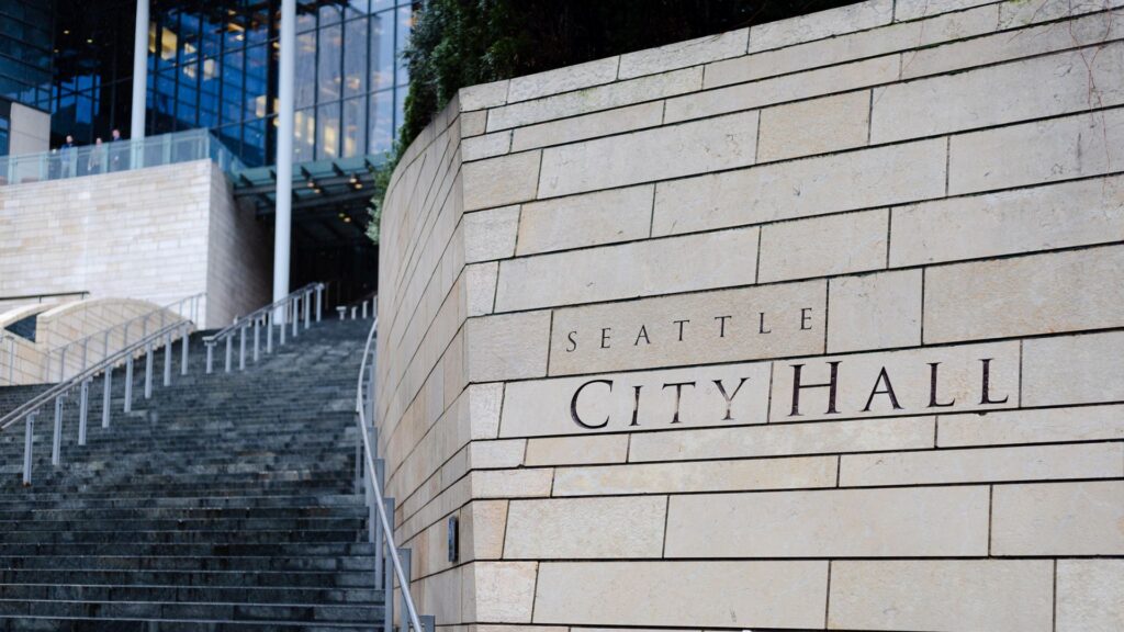 Seattle City Hall entrance with engraved signage.