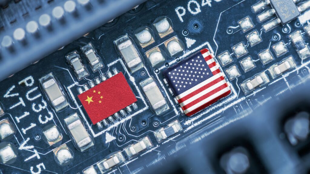 Chinese and American flags embedded on a circuit board.